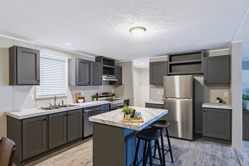Photo of 25124 Huckleberry Way, Astatula, FL 34705 (MLS # G5118832)