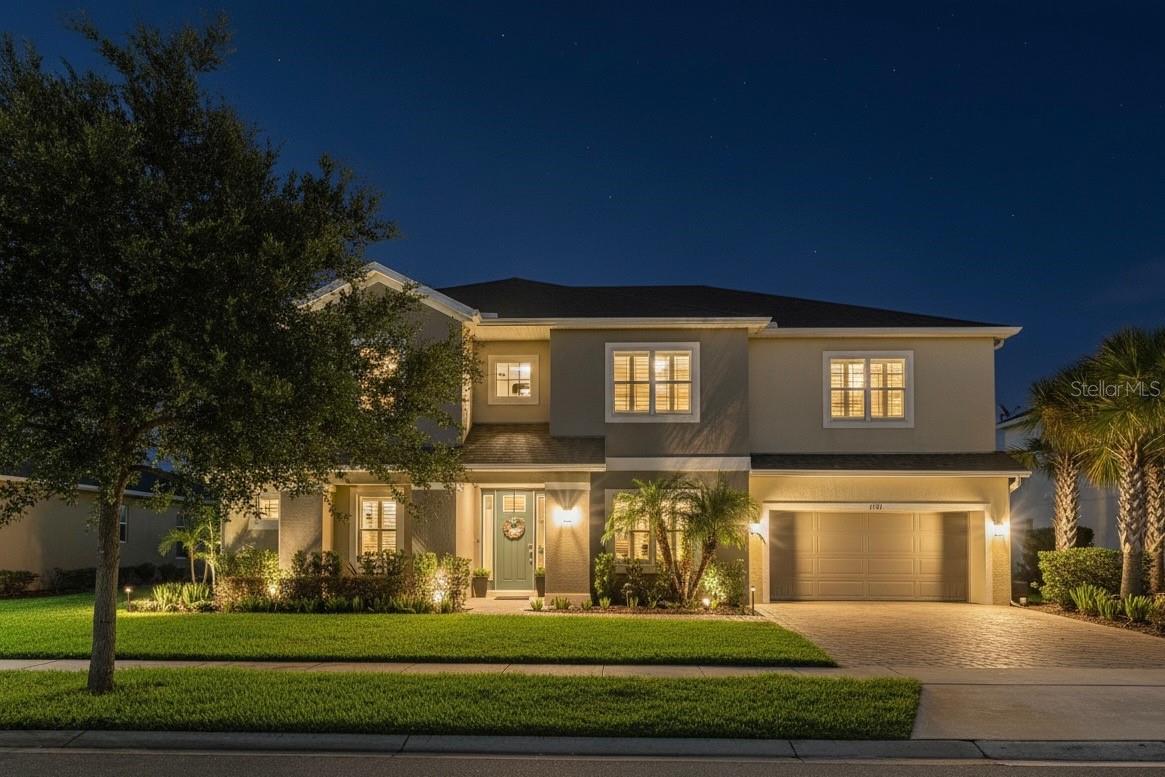 Welcome to 1113 Fieldstone Circle, a rare opportunity in the GATED COMMUNITY of Retreat at Lake Charm. Built in 2019, this 6-BEDROOM, 3.5-BATHROOM executive home offers over 4,200 SQUARE FEET of versatile living space that combines luxury finishes, functional design, and room to grow.Positioned on an OVERSIZED LOT with uninterrupted POND VIEWS, this WEST-FACING PROPERTY features a 3-CAR TANDEM GARAGE, EXTENDED PAVER PATIO, and a FULLY FENCED BACKYARD—already PRE-WIRED FOR AN OUTDOOR KITCHEN AND POOL. A CUSTOM PERGOLA and PROGRAMMABLE PERMANENT LIGHTING elevate the outdoor experience for year-round curb appeal and holiday-ready ambiance.Inside, the thoughtful layout includes a FIRST-FLOOR PRIMARY SUITE and a DEDICATED HOME OFFICE, perfect for flexibility in today’s lifestyle. The centerpiece of the home is the GOURMET DOUBLE-ISLAND KITCHEN, featuring QUARTZ COUNTERTOPS, STAINLESS STEEL APPLIANCES (including a NEW REFRIGERATOR AND DISHWASHER), WALK-IN PANTRY, and direct flow into the family and dining areas. The TWO-STORY FAMILY ROOM boasts dramatic CUSTOM MILLWORK, creating a stunning architectural focal point. Just off the kitchen is a SPACIOUS INDOOR LAUNDRY ROOM with room to organize and store. Upstairs, you'll find FIVE LARGE BEDROOMS, FOUR WALK-IN CLOSETS, a VERSATILE LOFT, and a PRE-WIRED MEDIA ROOM, ideal for a home theater, playroom, or second living space. A JACK-AND-JILL BATHROOM with separate vanities connects two of the upstairs bedrooms for added convenience.Other premium features include PLANTATION SHUTTERS, IMPACT-RATED TINTED WINDOWS, energy-efficient systems, smart thermostat, and elegant lighting upgrades throughout. The OVERSIZED TANDEM GARAGE allows for vehicles, storage, hobbies, or even a home gym setup. Located in one of the most desirable areas in Central Florida, OVIEDO offers a unique blend of small-town charm and modern convenience. Residents enjoy access to beautiful parks, nature trails, local farmers markets, and a vibrant dining and retail scene—including the popular Oviedo on the Parktown center. The property is conveniently situated near major commuting routes and just a short drive from the University of Central Florida (UCF), Seminole State College, Valencia College, and several highly regarded private school options.Retreat at Lake Charm includes LOW HOA DUES AND NO CDD, and is surrounded by newer, well-maintained homes in a gated setting that provides peace of mind and long-term value. POOL RENDERINGS AND COST ESTIMATES ARE AVAILABLE—making it easy to bring your dream backyard to life.This is a move-in-ready home that delivers on space, quality, and location. Don’t miss the chance to tour one of Oviedo’s premier properties—schedule your private showing today.
