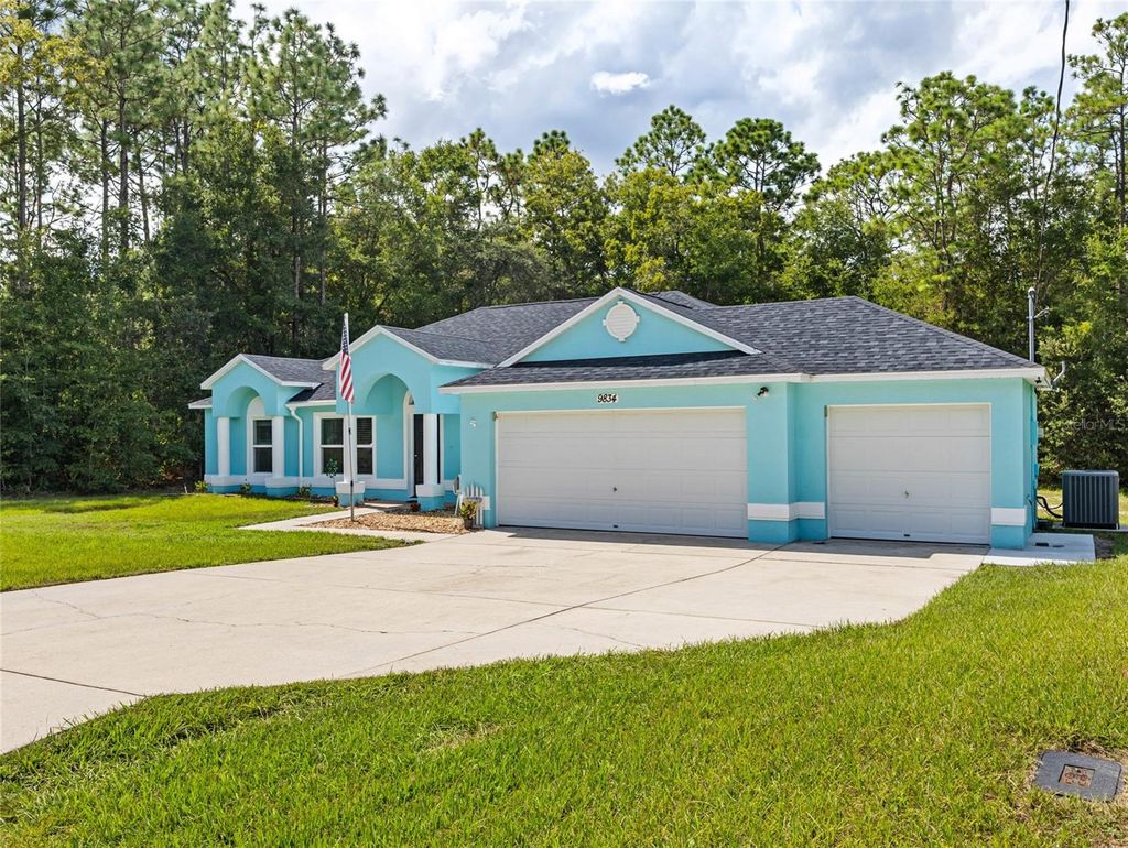 Photo of 9834 N Bonita Circle, Citrus Springs, FL 34434 (MLS # OM709715)