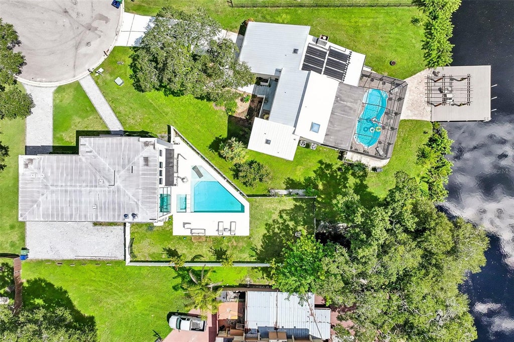 Photo of 8103 N River Shore Drive, Tampa, FL 33604 (MLS # TB8548657)