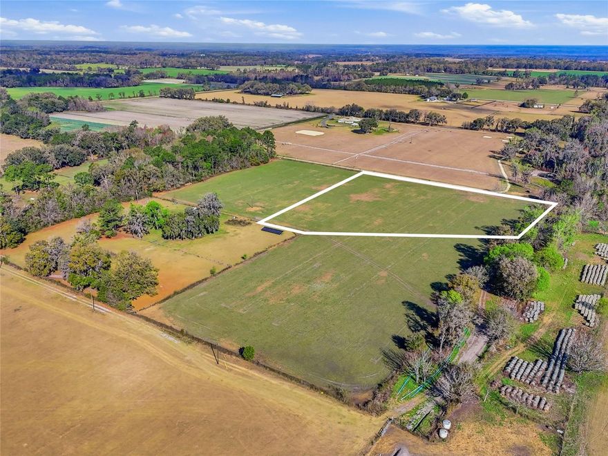Discover a rare opportunity to own 5+ acres in beautiful Alachua, Florida, offering the perfect canvas for your forever home. Located in a peaceful farm community in North Florida, this high-and-dry, Agricultural-zoned property is thoughtfully cleared and ready for your vision. With no HOA and no deed restrictions, you’ll enjoy the flexibility and freedom to build exactly what you’ve been dreaming of. Privately tucked away for peace and seclusion, this spacious property provides the ideal setting for a custom home, small farm, homestead, or private country retreat. Surrounded by the natural beauty and quiet charm of Alachua, the property offers the tranquility of rural living while remaining conveniently close to modern amenities. Looking for even more space? Three additional adjoining parcels are also available, giving buyers the unique opportunity to purchase all four parcels together for over 20 acres, creating a private estate, family compound, or expansive farm. Enjoy the best of both worlds — serene country living just minutes from the Santa Fe River, I-75, nearby shopping, medical facilities, and an easy commute to Gainesville for work, dining, and entertainment. Opportunities like this are becoming increasingly rare — combining acreage, versatility, privacy, and convenience in one exceptional North Florida offering. Build the sanctuary you’ve always envisioned and experience the charm and tranquility that make Alachua such a special place to call home.