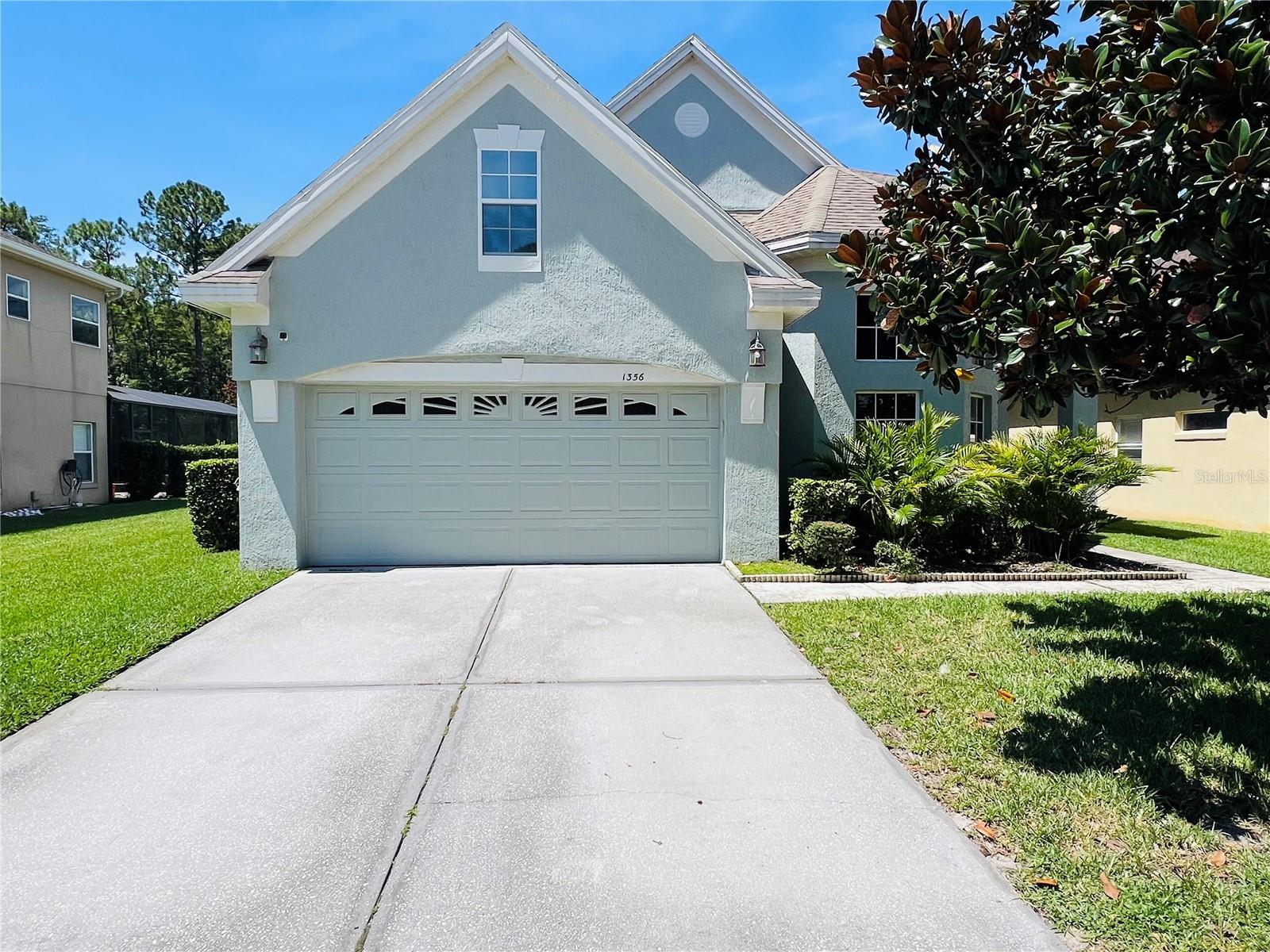 Beautiful two-story single-family home featuring 4 bedrooms, 2.5 bathrooms, and a 2-car garage. The primary bedroom is conveniently located on the first floor. Enjoy a fully fenced backyard with a tranquil lake view. Located in the Gated Woodland Lakes Community This secure neighborhood offers a gated entrance with guard service, as well as amenities including a swimming pool and playground. Prime Location with Excellent Connectivity Easy access to Highway 408 and 417, with shopping and dining just minutes away. Only 17 minutes to Orlando International Airport.