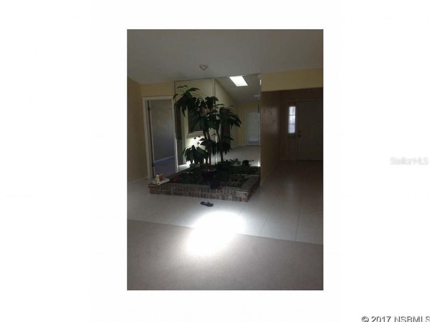 Open, bright, updated, and beautifully maintained home in the heart of Port Orange. Granite counter tops, tall white cabinetry, and stainless appliances fill the kitchen. Huge master bedroom with vaulted ceiling; master bathroom has granite counter tops with custom wood cabinetry along with a large, tiled, walk-in shower. Spare bathroom also has granite counter tops and tile floor. Great Port Orange school zones: Spruce Creek Elementary, Creekside Middle, and Spruce Creek High. Walk to Neighbors Ice Cream or All Children's park! No HOA, fenced-in yard, roof less than 10 years old and looks brand new. A/C only 3 years old. Square footage received from tax rolls. All information recorded in the MLS intended to be accurate but cannot be guaranteed.