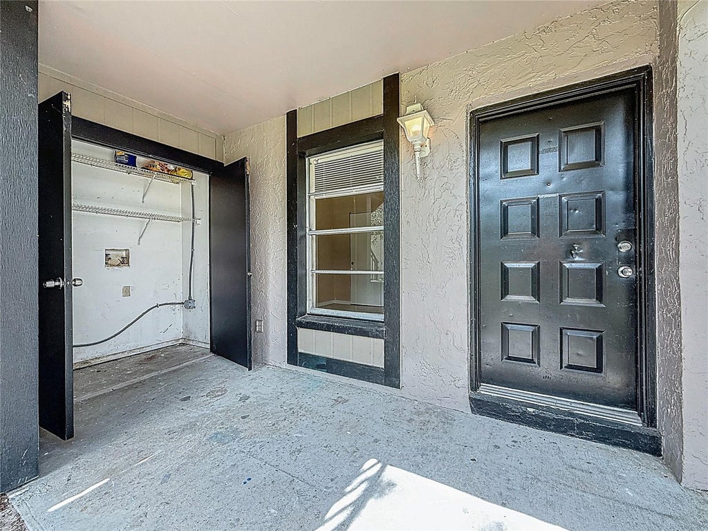 Photo of 4022 Tumble Wood Trail #101, Tampa, FL 33613 (MLS # L4965512)