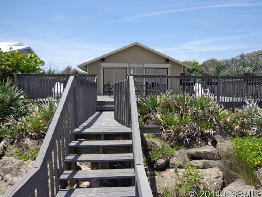 Ocean front Florida paradise with significant rental income! Enjoy the sunrise and ocean breezes from your front deck and living room. Tropical outside shower for rinsing off after a beach day. Travertine tile throughout the living, dining, and kitchen. Huge 2 car garage with room to add additional living space on the 1st floor. This well maintained 3/2 has a great vacation rental history. Large master suite prefect for relaxing after a day in the sun, and 2 guest bedrooms. Room dimensions are estimated. NEW AC condenser 2013 under warranty, new carpet in bedrooms, new electrical outlets in garage, roof 10 years old. ;Water: City