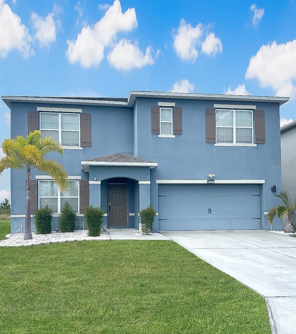 Photo of 5837 Arlington River Drive, Lakeland, FL 33811 (MLS # O6354183)