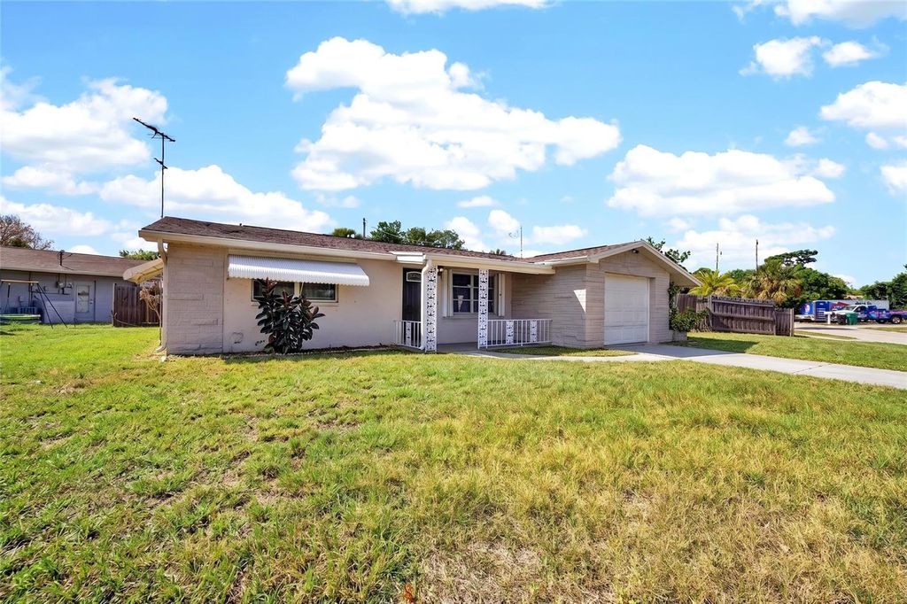 Photo of 10735 Darius Street, Port Richey, FL 34668 (MLS # W7885128)