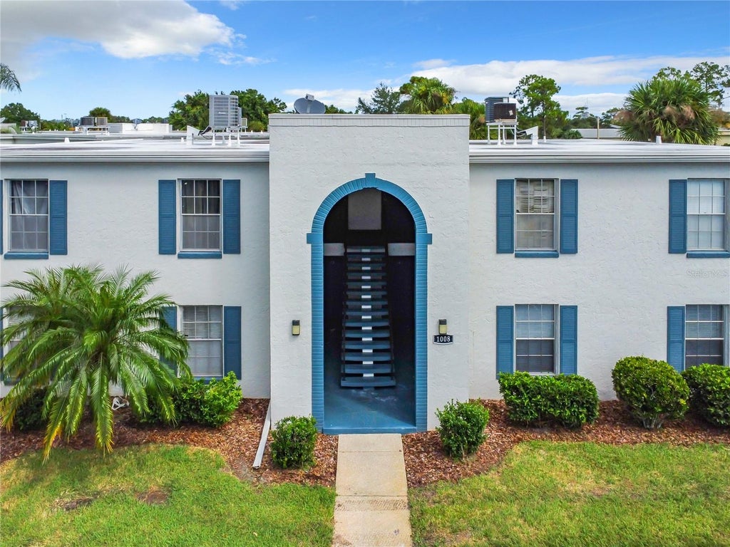 Photo of 1008 Plantation Drive #F15, Kissimmee, FL 34741 (MLS # O6452410)