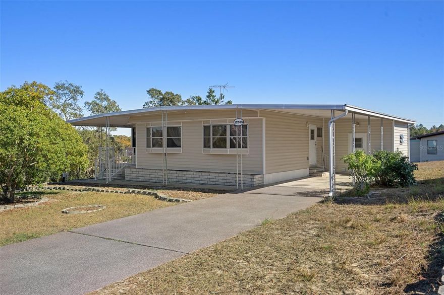 This charming 2-bedroom, 2-bathroom home is located in a desirable High Point  55+ community where you own the land, offering both privacy and flexibility. Enjoy an active lifestyle with a variety of amenities, including golfing, pickleball, shuffleboard, a pool, and a range of community events. Relax in the enclosed lanai with new acrylic windows. The master bedroom is equipped with a  and handicap-accessible bathroom and built-in storage for added convenience. The open floor plan provides a spacious living area, while the large utility room offers a work space and ample storage. The home features concrete skirting, New custom sealed and painted driveway, and new vinyl siding in 2023 for durability and curb appeal. New Florida Room and so much more.