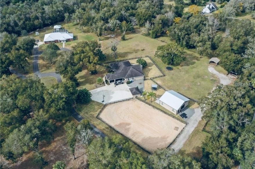 Calling all horse enthusiasts—this 2.5-acre Equestrian Estate on a quiet cul-de-sac is a must-see! This stunning custom-built 4-bedroom, 2-bath home offers over 2,400 sq. ft. of thoughtfully designed living space, including a 3-car side-entry garage.
The property features a 36' x 36' fully equipped, 3-stall horse barn built in 2016, with a tack room, riding pen, and three exterior pens. Bring your pets and horses—this home is ready for them!
Inside, enjoy a bright, open floor plan with vaulted ceilings, crown molding, hardwood floors, and a cozy wood-burning fireplace. The chef’s kitchen has granite countertops, solid wood cabinetry, and plenty of space for entertaining. Additional highlights include formal living and dining rooms and a bonus room for a home office or extra bedroom.
Parking and storage abound with a 3-car garage, detached garage, and carport—plus room for your boat, RV, or other toys. Fully fenced with an irrigation system and no HOA restrictions. A whole-house water purification system adds peace of mind.
Minutes from Lake Woodruff National Wildlife Refuge, DeLeon Springs for hiking, boating, and wildlife photography, plus historic downtown DeLand. Enjoy peaceful country living with easy access to shopping, dining, and I-4. Buyers must be pre-approved and a 24 hour notice requirement