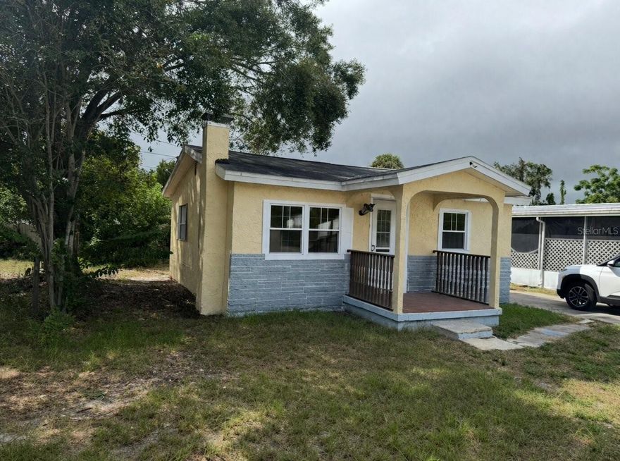 Beautiful 2 bed/ 1 bath cozy single family home, open floorpan, new title flooring throughout, stainless steel appliances, Washer/dryer hookup, central A/C, fenced in, 2 car carport, easy access to main roads. Looks new, must see.