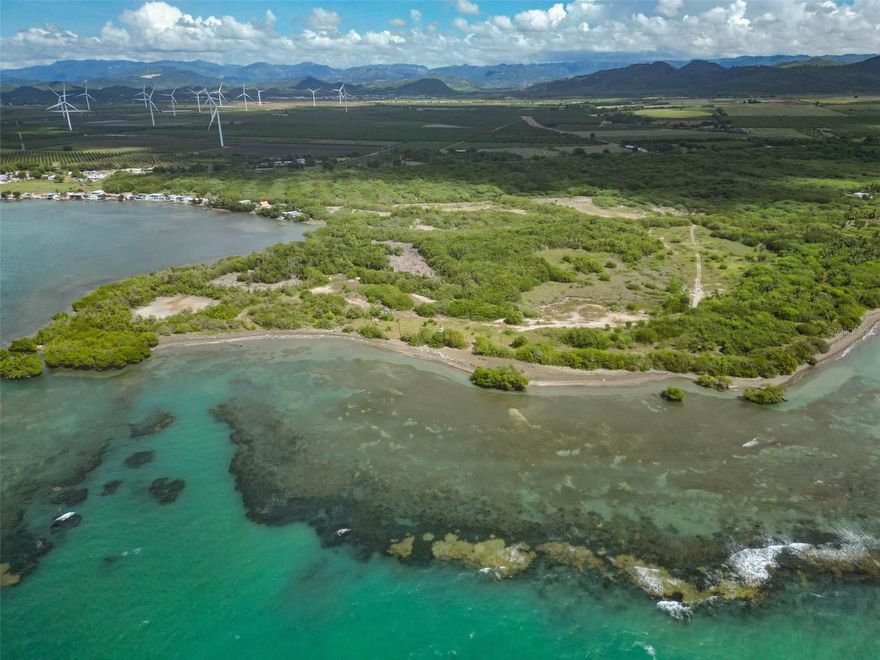 Unlock the potential of this exceptional 103 acre beachfront parcel located in the charming town of Santa Isabel, Puerto Rico. Known as the “Land of Champions,” Santa Isabel is a tranquil coastal gem steeped in history, culture, and natural beauty. Situated just south of kilometer 98.9 of PR-1, this expansive land offers breathtaking views of the Caribbean Sea and easy access to pristine beachfront areas, making it an ideal location.

Key Features:

• Size: 103 acres of prime beachfront land

• Location: Santa Isabel Municipality, south of kilometer 98.9 of PR-1

• Views: Stunning waterfront vistas overlooking the Caribbean Sea

• Accessibility: Direct access via PR-1, ensuring convenient connectivity to major areas

• Zoning: DTS (Selective Tourist Development) allowing for versatile development options

• Development Potential: Ideal for private residential projects or commercial ventures

• Natural Surroundings: Proximity to ecological sensitive areas, including wetlands and mangroves

• Utilities: Available access to paved streets, electrical service, water, sanitary, and storm sewer systems

• Privacy: Spacious and versatile layout suitable for large-scale projects

Santa Isabel: A Hidden Gem of the South

Santa Isabel, founded in 1842 by Governor Santiago Méndez Vigo, is renowned for its rich agricultural heritage and vibrant community spirit. The town's lush landscapes are a testament to its fertile lands, historically dominated by sugar cane cultivation, which has earned it the nickname “Tierra de Campeones”. Today, Santa Isabel seamlessly blends tradition with modernity, offering a unique living experience.

Natural Beauty and Outdoor Amenities:

Embrace the natural splendor of Santa Isabel with its pristine beaches like Jauca Beach and Cortada Beach, perfect for swimming, sunbathing, and water sports. The nearby Parque de la Reina and El Malecón boardwalk provide serene spots for relaxation and recreation, while the Punta Petrona Natural Reserve offers opportunities for eco-tours and nature walks amidst mangroves and diverse marine life.

Vibrant Community and Lifestyle:

Santa Isabel boasts a vibrant community with excellent amenities, including seafood restaurants, bars, and local shops along El Malecón. The town is also famous for its passionate baseball culture, home to the Santa Isabel Potros and producing notable Major League players like Carlos Correa and Benito Santiago.

Opportunity Highlights:

This prime beachfront parcel presents a unique opportunity for investors and developers looking to create luxurious private residences or dynamic commercial enterprises in a sought-after coastal location. Whether envisioning a serene, ultra-private residential compound, a high-end commercial development, or a combination of both, this land provides a versatile canvas to bring your vision to life.

Why Choose Santa Isabel?

Santa Isabel offers more than just beautiful landscapes; it provides a lifestyle enriched with history, culture, and community. Its strategic location ensures easy access to major employment centers, educational institutions, and recreational facilities, making it an attractive destination for both residents and visitors alike.