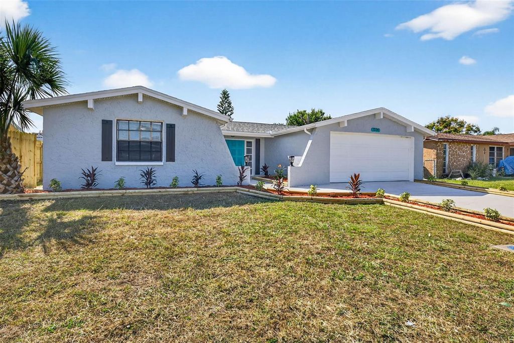 Photo of 7334 Fox Hollow Drive, Port Richey, FL 34668 (MLS # TB8440953)