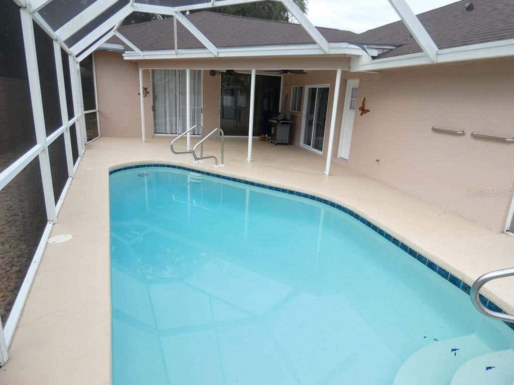 Photo of 907 Brittany Park Boulevard, Tarpon Springs, FL 34689 (MLS # W7887781)