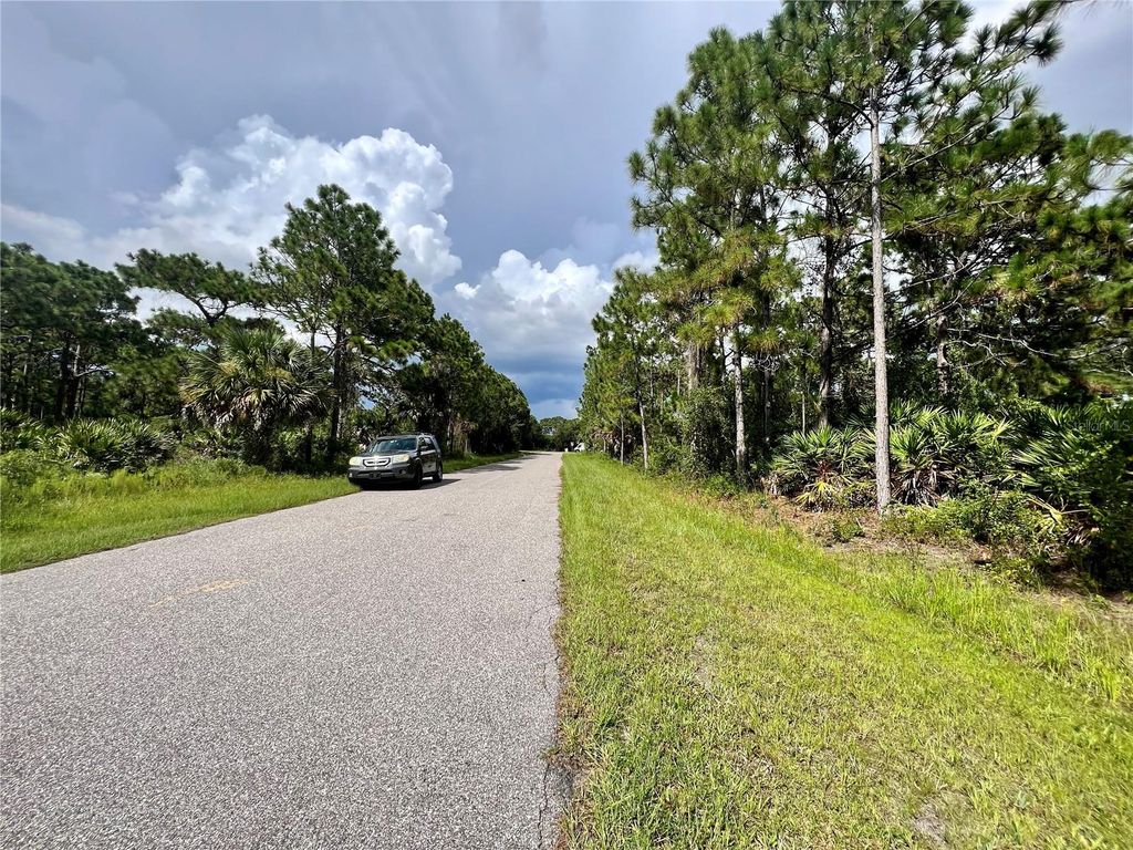 Photo of 12393 Prudential Avenue, Port Charlotte, FL 33981 (MLS # C7494384)