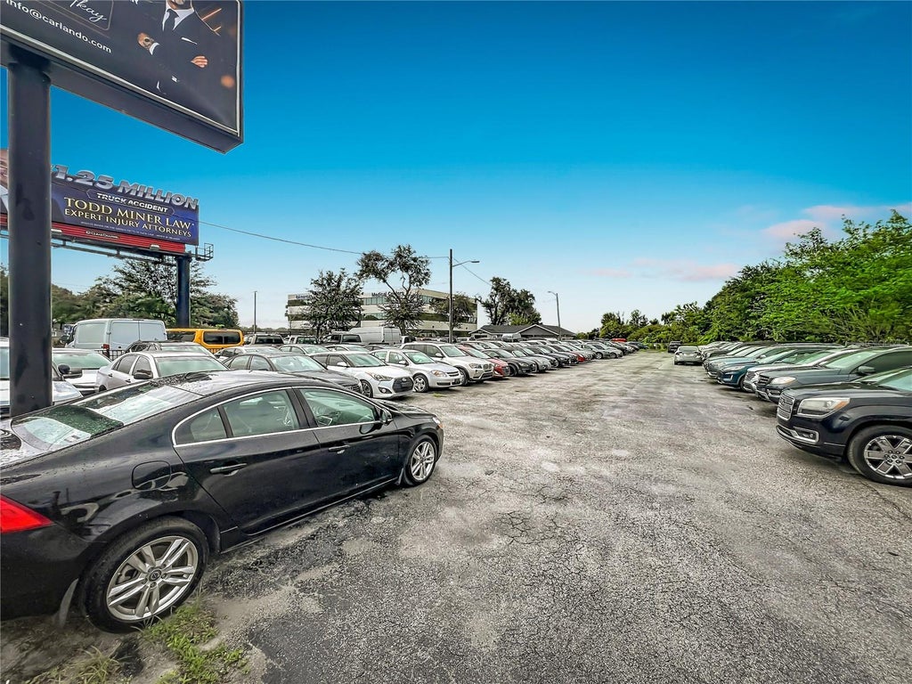 Photo of 690 N Semoran Boulevard, Orlando, FL 32807 (MLS # O6451212)