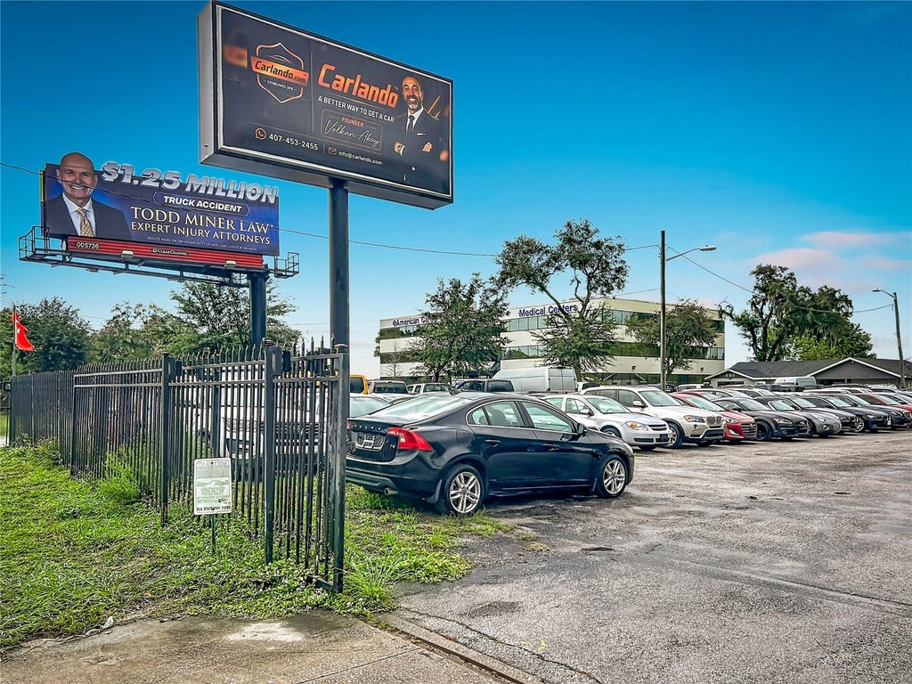 Photo of 690 N Semoran Boulevard, Orlando, FL 32807 (MLS # O6451212)