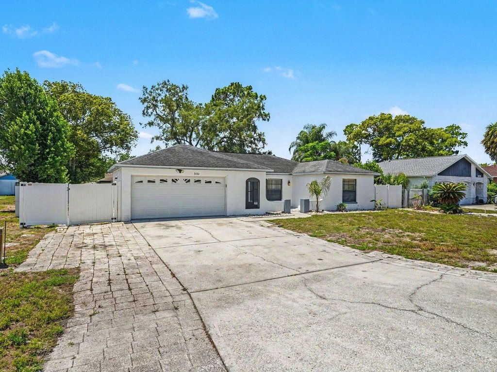 Photo of 8180 Wooden Drive, Spring Hill, FL 34606 (MLS # TB8509261)