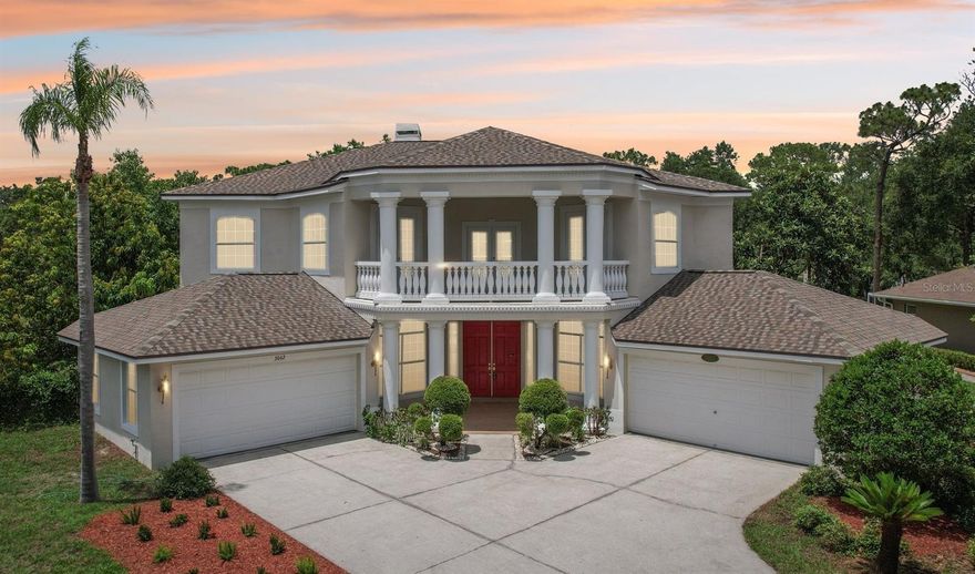 Step into timeless elegance in this stunning executive family home featuring five spacious bedrooms and four beautiful bathrooms and over 4500 sq ft of heated living space on .39 acre large corner lot with a gorgeous backyard! From the moment you enter, you’re greeted by a dramatic custom medallion entryway, soaring 22-foot ceilings, elegant columns, and handcrafted wood balusters framing a show stopping chandelier. This exceptional home was even featured in a Super Bowl commercial, a true testament to its grandeur.

Designed with versatility and luxury in mind, this home is perfectly suited for large or multigenerational families. With multiple living areas, a large formal dining room, and an expansive breakfast nook that also serves as an additional dining space, the layout provides ample room for gatherings, entertaining, or quiet moments of retreat.

Enjoy the rare convenience of three master suites—one located on the main floor for easy access, and two upstairs, offering ideal accommodations for parents, guests, or extended family members seeking privacy.

The home showcases refined finishes throughout, including real wood flooring, custom marble flooring with intricate granite inlays, a wood burning fireplace framed by a French Louis XV marble mantle, along with a James Moder Princess chandelier, adding a luxurious touch to the main living area. The chef-inspired kitchen has granite countertops, stainless steel appliances, dual sinks, a large center island, and upgraded herringbone wood tile flooring. A sun-drenched eat-in area with expansive windows provides a picturesque view of the covered pool patio.

Entertain effortlessly with a triple sliding glass doorthat opens to a covered lanai and sparkling pool—perfect for weekend barbecues or tranquil evening swims. Each bathroom is thoughtfully designed with luxury finishes like granite, marble, and travertine.

The oversized downstairs master suite is a private retreat, filled with natural light and designed for relaxation. It features a spa-inspired bathroom with a jetted soaking tub, a spacious step-in shower, dual vanities, and an expansive double-sided walk-in closet.

Additional features include:

·       A rare 4-car garage

·       Two spacious second-story walk-out balconies (one overlooking the front yard, the other the pool)

·       Mature fruit-bearing trees: avocado, mango, guava, Japanese plum, and more

·       New roof (2021)

·       Multiple A/C systems for optimized comfort and energy efficiency

Situated on one of the most desirable custom estate streets in the area, this home is zoned for A-rated schools and just minutes from shopping, dining, and major roadways—perfectly located between Tampa, Orlando, and Florida’s beautiful beaches. Walden Lake is a gated community with miles of lakeside walking trails, parks & playgrounds, sports fields & dog park. The elementary school is also located inside the community and one of the best schools in the area. No CDD , low HOA for all that is offered in beautiful community. 

This residence offers the perfect blend of sophistication, comfort, and convenience—ideal for both everyday living and elevated entertaining.