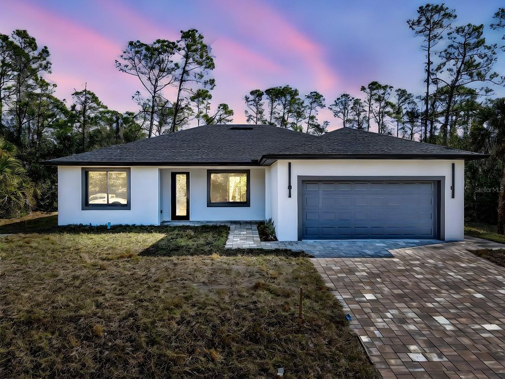 Photo of 72 Shoreland Street, Port Charlotte, FL 33954 (MLS # O6369009)