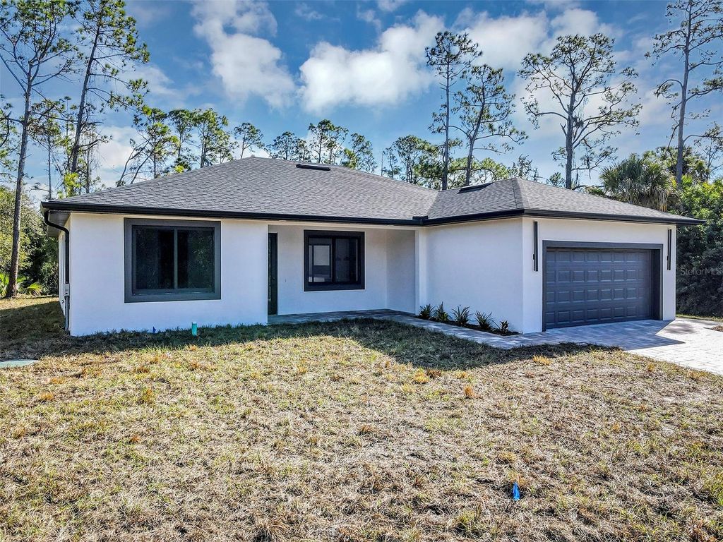 Photo of 72 Shoreland Street, Port Charlotte, FL 33954 (MLS # O6369009)