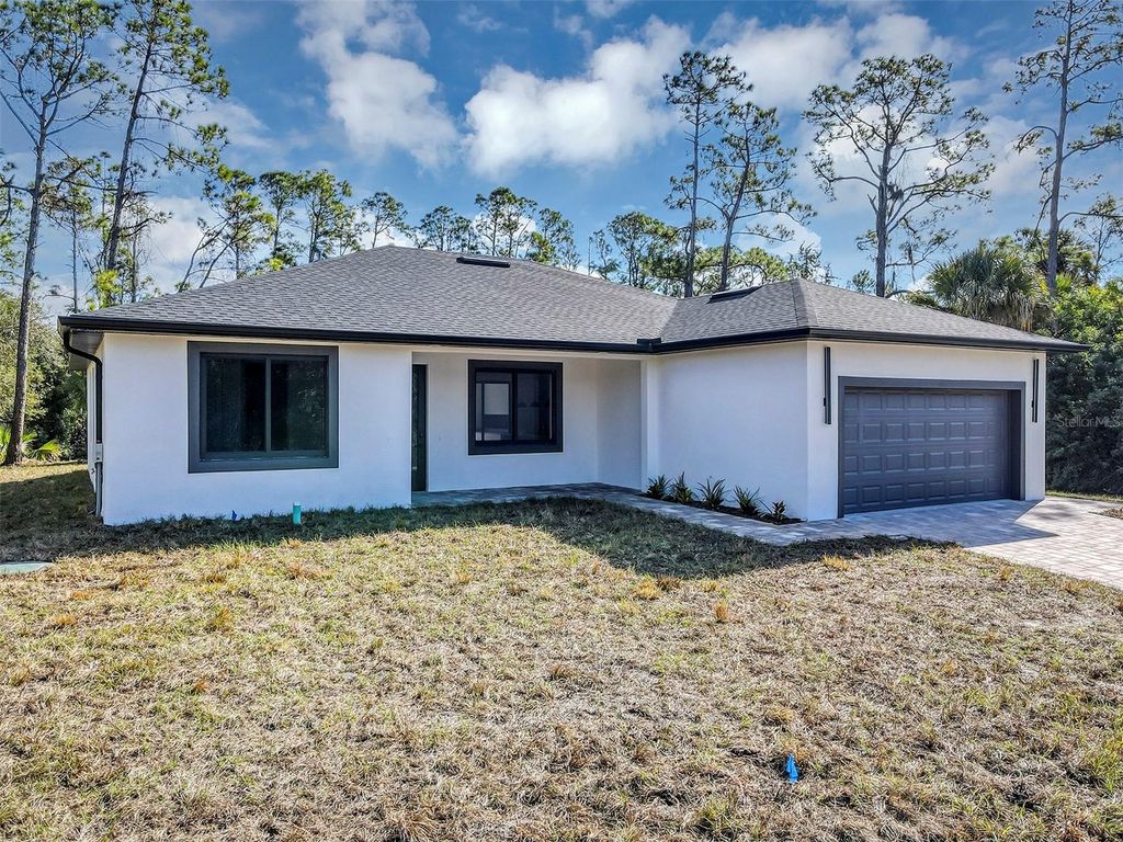 Photo of 72 Shoreland Street, Port Charlotte, FL 33954 (MLS # O6369009)