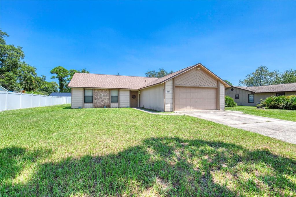Photo of 2815 Travelers Palm Drive, Edgewater, FL 32141 (MLS # V4945556)