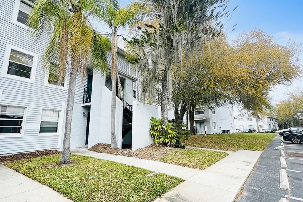 Photo of 7120 Waterside Drive #106, Tampa, FL 33617 (MLS # O6397405)