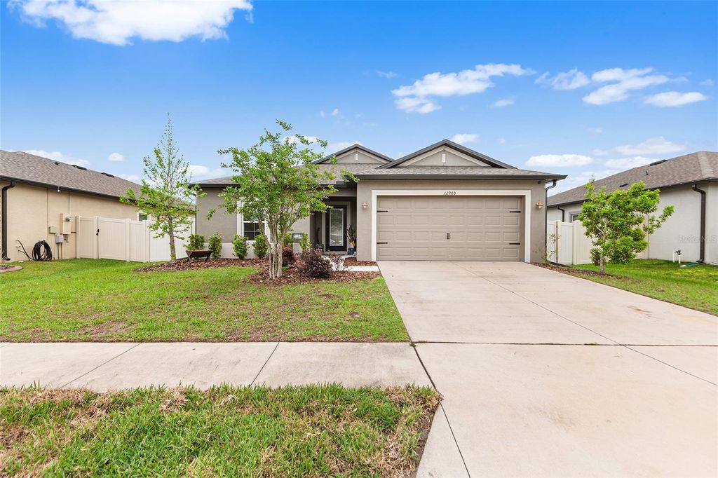 Photo of 12960 Conquistador Loop, Spring Hill, FL 34610 (MLS # TB8497605)