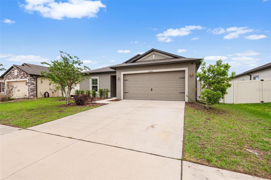 Photo of 12960 Conquistador Loop, Spring Hill, FL 34610 (MLS # TB8497605)