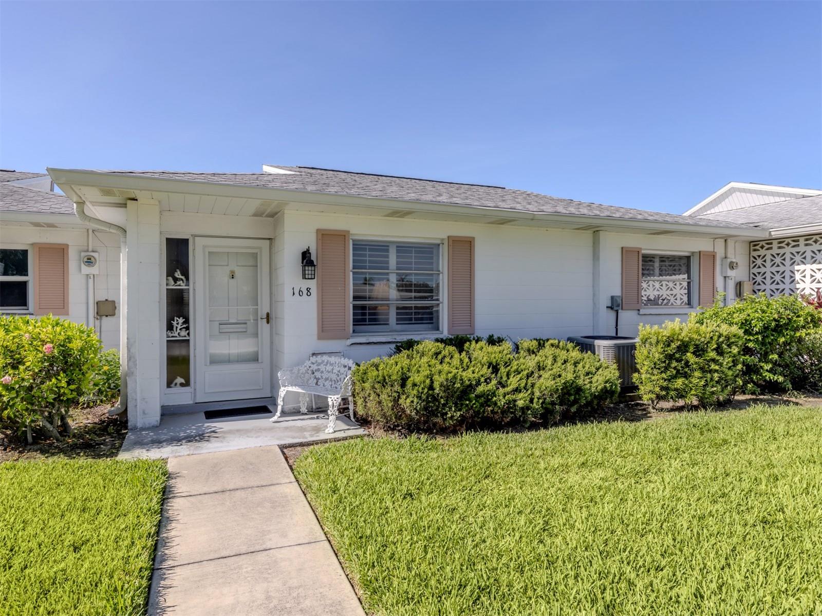 Welcome to your coastal retreat on beautiful Venice Island! This charming ground-level condominium offers a blend of comfort and style, featuring two spacious bedrooms and a full bath. The primary bedroom includes a walk-in closet, providing ample storage and convenience. Bright and airy, the home is beautifully accented with plantation shutters throughout, providing elegance and privacy. The unit is being sold furnished, making your move-in process seamless and hassle-free. As an association convenience, basic cable TV is included. Ideally less than one mile from the sparkling beaches, you'll enjoy easy access to sun, surf and seaside living. Whether you're seeking a vacation getaway or a cozy year-round residence, this delightful condominium offers the ideal opportunity to embrace the beach lifestyle. Don’t miss out on this fantastic opportunity! Experience resort-style living with exceptional community amenities in this 55-plus community, including a welcoming clubhouse equipped with a full kitchen, comfortable tables and chairs, baths, a sparkling community pool, shuffleboard courts and an on-site laundry facility. In a prime location, this villa offers a blend of relaxation and convenience—less than a mile from beautiful beaches, just 1.3 miles from the lively pier surrounded by restaurants and shops, and only 1.8 miles from historic downtown Venice. Additionally, you'll find shopping, dining, theaters, parks, boating, tennis and Humphries Park South jetty all within three miles or less. This move-in-ready villa invites you to embrace the vibrant island lifestyle you've always dreamed of on Venice. Schedule your appointment today to tour this stunning home and envision calling it your own.