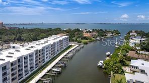 Available JULY 1/2025 THROUGH 11/01/2025. NOT AVAILABLE FOR SEASONAL RENTAL/ $4000 A MONTH ALL INCLUSIVE. The Strand of Sarasota, West of Trail and one mile from downtown Sarasota to Main Street and Palm Avenue! A community of 152 luxury condos with 47 private boat slips and direct access to Sarasota Bay and the Gulf of Mexico! Largest SQFT residence offered with custom upgrades in this brand-new 3rd floor unit PRESENTS a beautiful contemporary décor with beautiful furnishings. A large master ensuite with walk-in shower as well and a generous 2nd bedroom ensuite and 3rd full bath for your overflow of guests. This residence has designer upgrades, lighting, fixtures quartz countertops, custom closets and custom blinds. The chefs kitchen comes fully equipped with stainless appliances, upgraded glass tile backsplash, quartz countertops and large center island for entertaining. Step out onto your terrace from one of the two sets of 9’ sliding glass doors that flood the unit with natural daylight and enjoy the view of the canal and Sarasota Bay at sunset. The docks are equipped with water and electric. Enjoy the resort style amenities including heated swimming pool/spa, fitness center, gas fire pit and grills, electric car charging stations, dog park and kayak launch & storage. The Strand is convenient to all the arts, culture, dining, and entertainment that Sarasota has TO BE ENJOYED. A short distance to the new “Bay” entertainment area and beach. You will enjoy The Strand for your Summer getaway. . Pet friendly and fenced in large dog park. Dogs only up to 60lbs. There are units for purchase at The Strand so free feel to contact me.