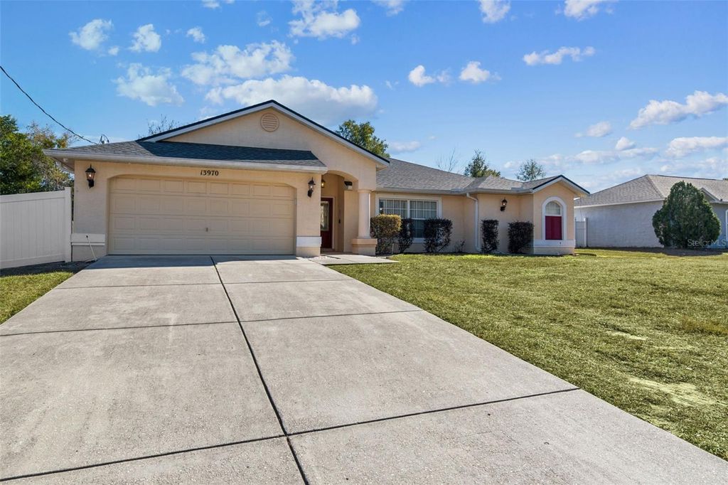 Photo of 13970 NW Coronado Drive, Spring Hill, FL 34609 (MLS # TB8467409)