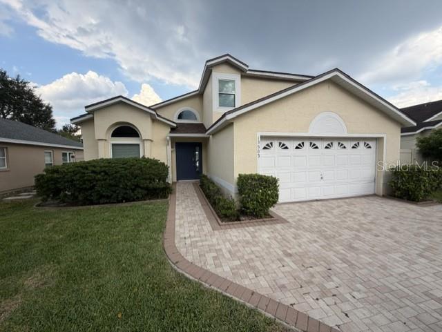 Photo of 13505 Mallard Cove Blvd, Orlando, FL 32837 (MLS # O6416406)