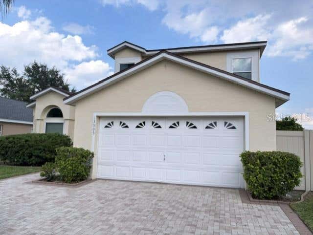 Photo of 13505 Mallard Cove Blvd, Orlando, FL 32837 (MLS # O6416406)