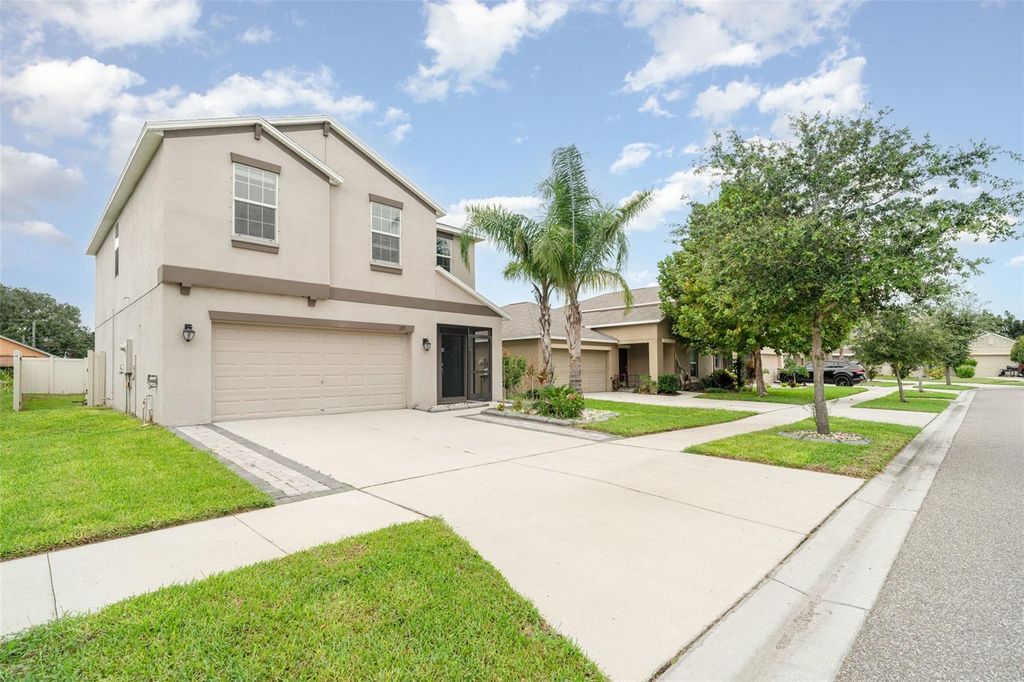 Photo of 129 Cascade Bend Drive, Ruskin, FL 33570 (MLS # O6343352)