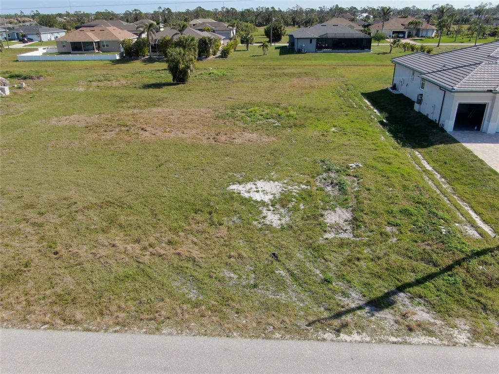 Photo of 191 Rotonda Boulevard S, Rotonda West, FL 33947 (MLS # D6140437)