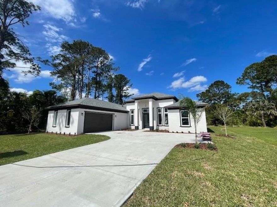 Take a look at this BRAND NEW 3 bedrooms, 2 1/2  bathrooms house with 14 ft ceilings in main area and 10 ft ceilings in all bedrooms! Luxurious Vinyl throughout the house, 42 in soft close cabinets and granite countertops, upgrated light fixtures! Oversized vinyl sliding door to the good sized lanai. Back yard has planty of space for your custom pool! You can bring ALL your tools, toys and more, because this beautiful home has an EXTENDED GARAGE.  Stop by and check it out!