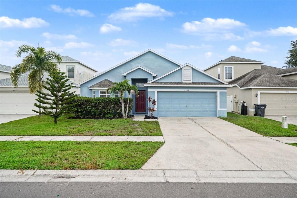 Photo of 4204 Morning Breeze Court, Tampa, FL 33619 (MLS # O6443000)