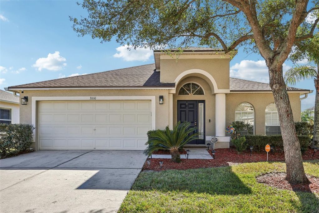 Photo of 31110 Stone Arch Avenue, Wesley Chapel, FL 33545 (MLS # TB8456958)