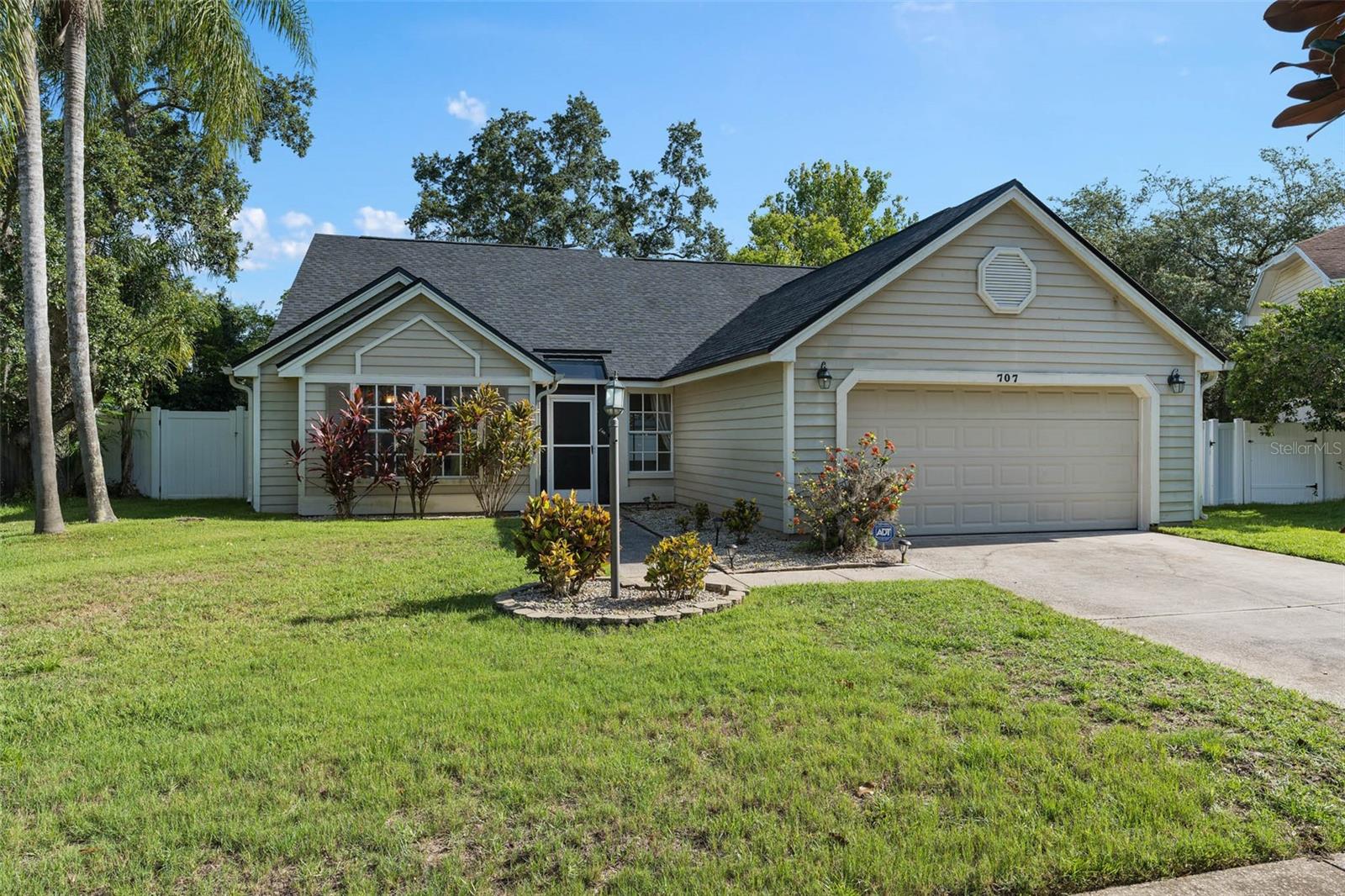 Welcome to 707 Lally Rock, a beautiful home located in a serene cul-de-sac offering tranquility and comfort. This 3-bedroom, 2-bathroom residence boasts tall ceilings that create a spacious and airy atmosphere. The modern kitchen features sleek stainless steel appliances and stunning granite countertops, perfect for culinary enthusiasts. The home is adorned with tile and laminate l flooring throughout, combining durability and style. Step outside to your private, fenced-in backyard, where you’ll find a covered and screened-in patio, an ideal space for relaxation and outdoor activities, rain or shine. Don't miss the opportunity to lease this charming property in a peaceful neighborhood.