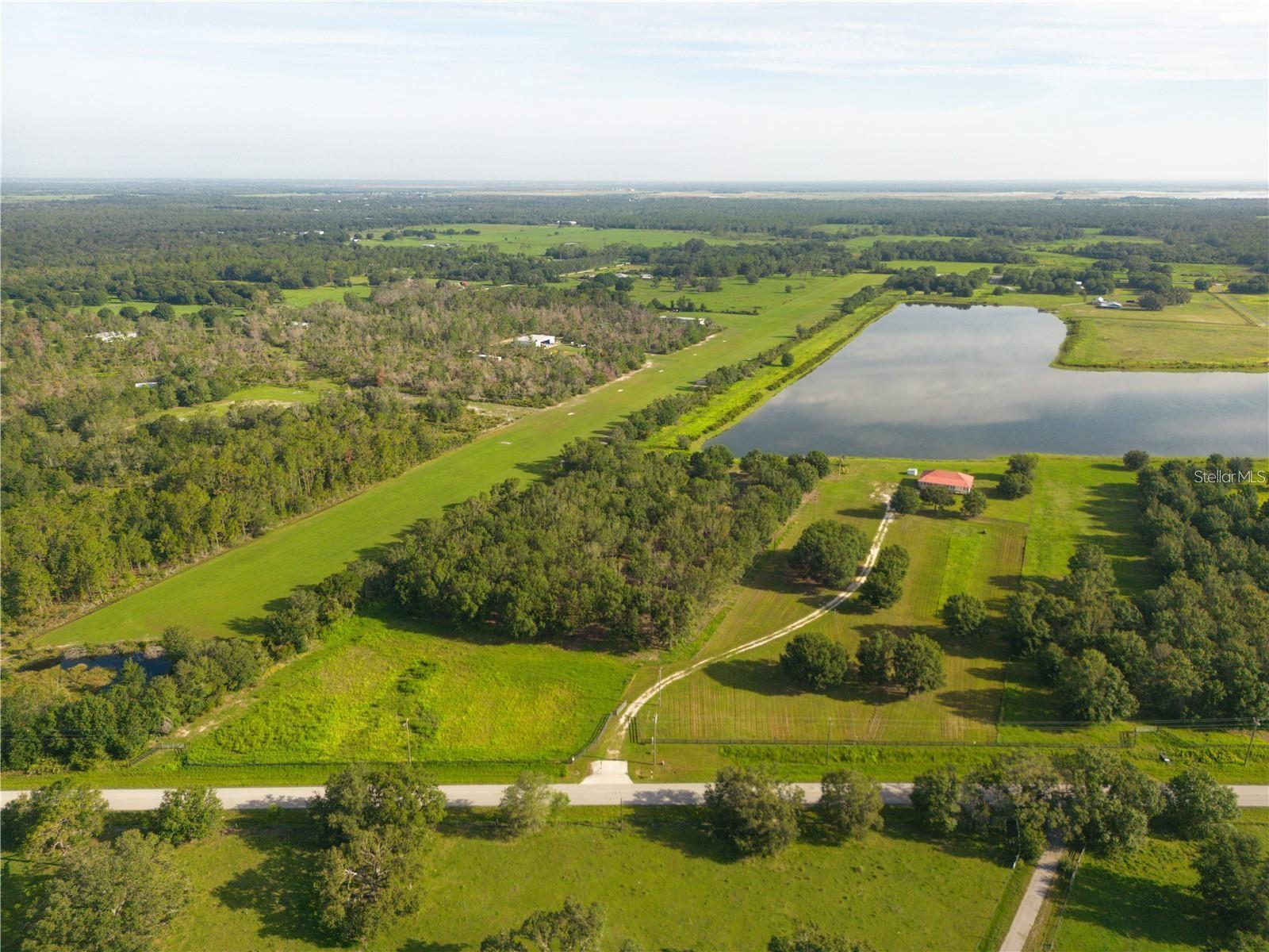 Your Private Waterfront Retreat Awaits – 6 Acres in Scenic Myakka, Florida
Discover the rare opportunity to own a 5-acre waterfront tract in the peaceful and picturesque town of Myakka, Florida. Nestled along the shores of a private lake, this stunning property offers a tranquil escape for outdoor lovers, nature enthusiasts, and anyone dreaming of wide-open space and serene surroundings.
A portion of the land has already been thoughtfully cleared for a homesite, providing the perfect starting point to build your custom dream home. As you explore the property, you’ll be captivated by majestic rows of mature trees that offer both natural beauty and cooling shade, creating an idyllic backdrop for your future oasis.
Whether you're an avid fisherman, enjoy morning walks by the water, or dream of riding ATVs across your own land, this property is your personal playground. The peace and privacy are unmatched, making it the perfect place to unwind, recharge, and truly connect with nature. Despite its serene setting, the property remains conveniently located with quick access to Interstate 75 and the vibrant city life of Sarasota. You’ll enjoy the perfect balance—close to beaches, shopping, dining, and entertainment, yet tucked away in your own slice of paradise.
Whether you're looking to build now or invest in your future, this property offers unparalleled potential. With its waterfront access, cleared homesite, towering trees, and unbeatable location, this 5-acre lot in Myakka is truly a rare gem.
Don’t miss this chance to turn your vision into reality! Schedule your showing today and experience the peaceful charm of Myakka living.