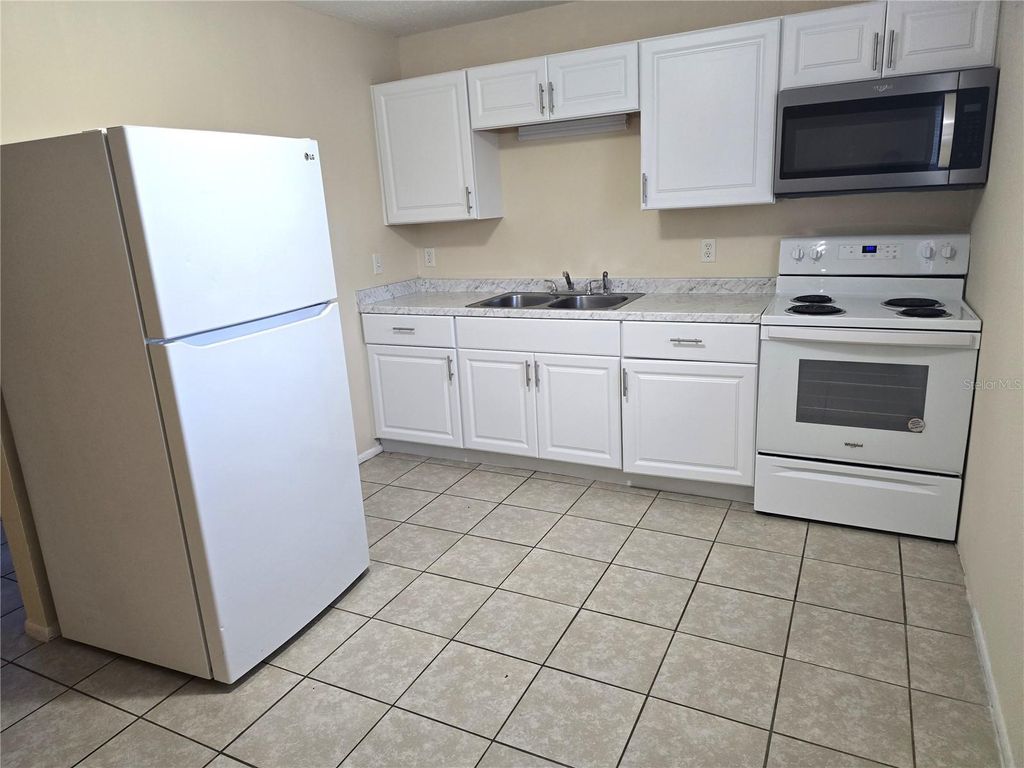 Photo of 820 W Chelsea Street, Deland, FL 32720 (MLS # O6352213)