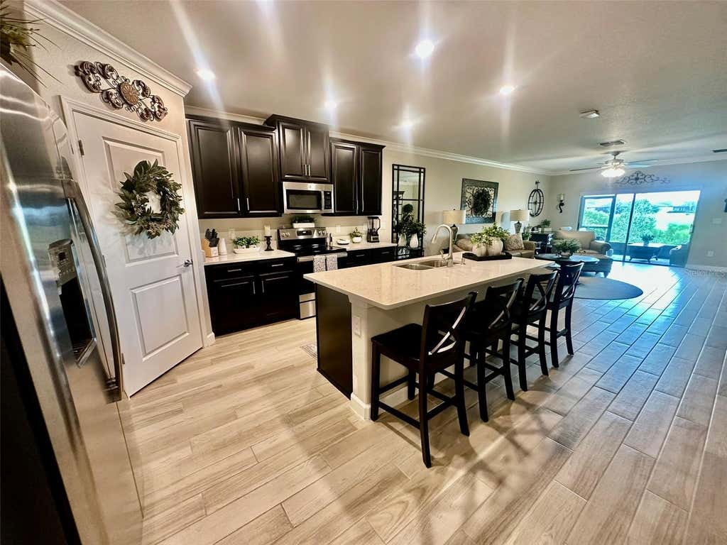 Photo of 10442 Echo Dock Loop, San Antonio, FL 33576 (MLS # TB8541026)