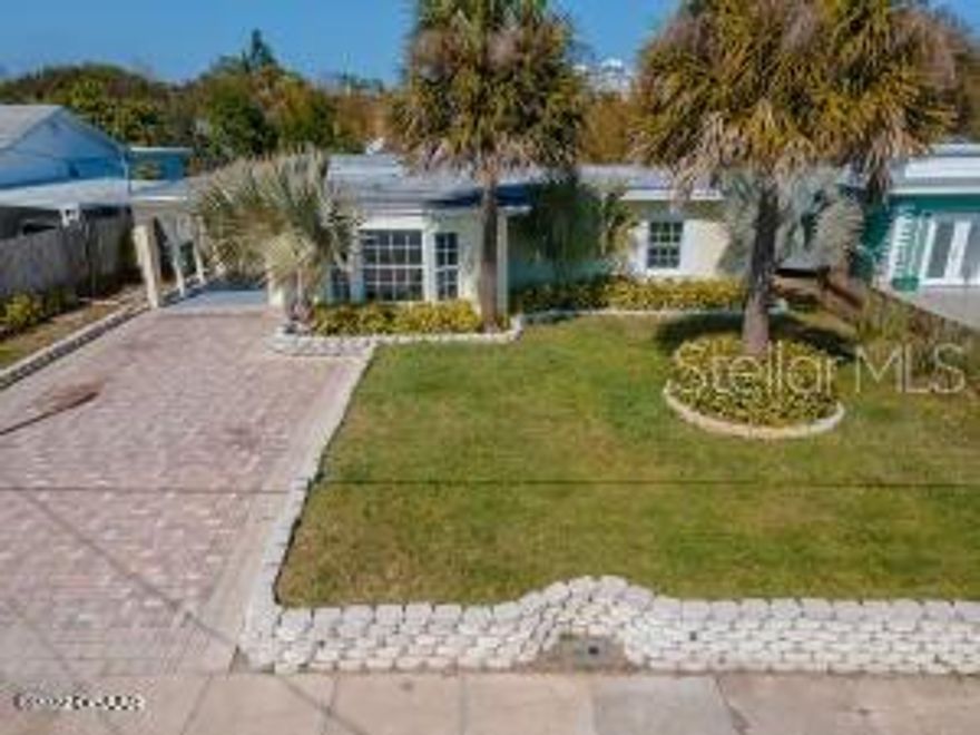 Beautiful 4 bedroom home a block from the beach. Upon entering you'll notice luxury vinyl throughout. Split plan home with lots of room to stretch out. Backyard sanctuary with large covered deck to enjoy the swaying bamboo in the spring breeze. Home was completely restored to the studs after hurricane Matthew, including the roof. new hot water heater and new a/c. In ground well for outside water use. Nearby Grocery, restaurants, and shopping. All information in MLS intended accurate but cannot be guaranteed. sqft received from tax rolls

All information in MLS intended to be accurate but cannot be guaranteed. Sqft received from tax rolls. ;Water: City