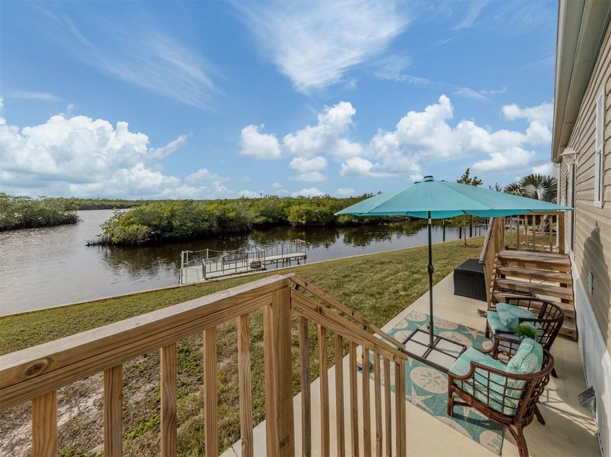 Experience waterfront living at its finest in this stunning 2023-built, 2-bedroom, 2-bath manufactured home situated along the scenic Myakka River in the highly sought-after Lazy River Village. Designed to meet the same rigorous standards as traditional wood-frame homes, this residence is built to withstand Florida’s storms while offering modern luxury and comfort.  

Inside, the wide-open floor plan is perfect for both relaxation and entertaining, featuring high ceilings with elegant crown molding and an abundance of natural light. The stylish kitchen boasts solid wood cabinetry, a spacious island, and breathtaking river views through the large sliders in the open living area. The master suite is a serene retreat, offering its own stunning water view—imagine waking up each morning to the beauty of the Myakka. A second well-sized bedroom and an inside laundry room add to the home’s convenience.  

Step outside to your private dock, where you can launch a kayak, store your boat, cast a fishing line, or simply take in the picturesque west-facing views, mesmerizing sunsets and abundant wildlife including dolphins, manatees and wading birds. The home also features a generous 364 sq. ft. garage with an attached carport, plus a charming riverside patio perfect for unwinding in the coastal breeze. To make this home truly move-in ready, most of the high-end coastal furnishings and décor are included in the sale.  

Located in Lazy River Village, a premier 55+ waterfront community, residents enjoy a wealth of amenities, including a heated pool, spa, fitness center, pickleball and tennis courts, a marina, and a clubhouse with an active social calendar. Whether you're looking for an active lifestyle or peaceful waterfront serenity, this home offers the best of both worlds. Don't miss your chance to own this slice of paradise on the Myakka!