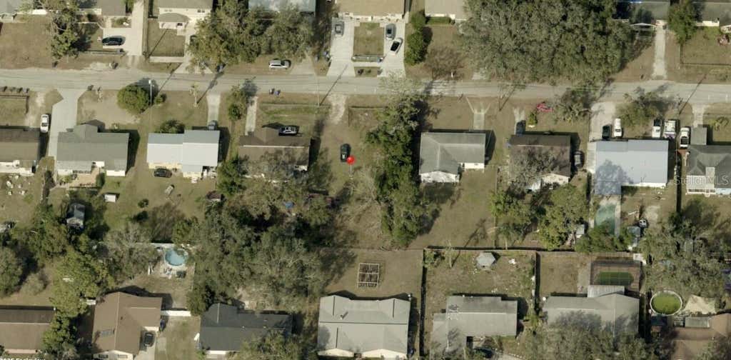 Photo of 8711 Navajo Avenue, Tampa, FL 33637 (MLS # A4703454)
