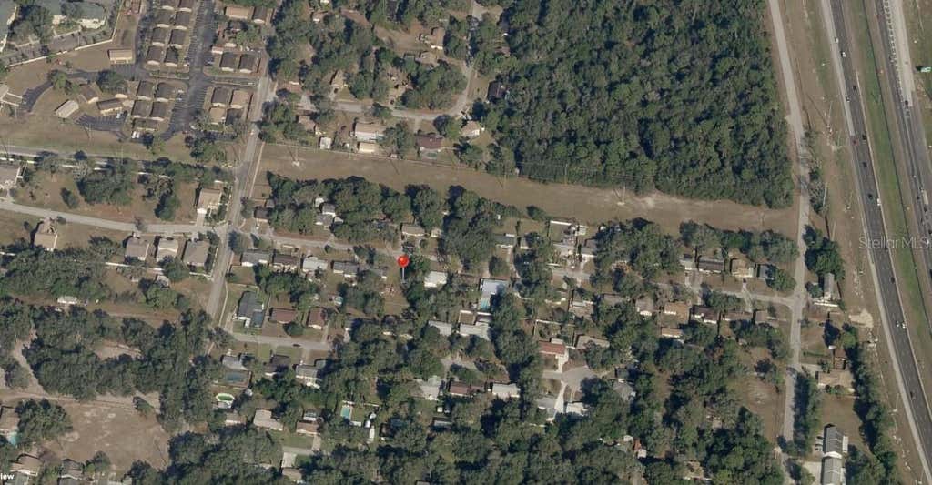 Photo of 8711 Navajo Avenue, Tampa, FL 33637 (MLS # A4703454)