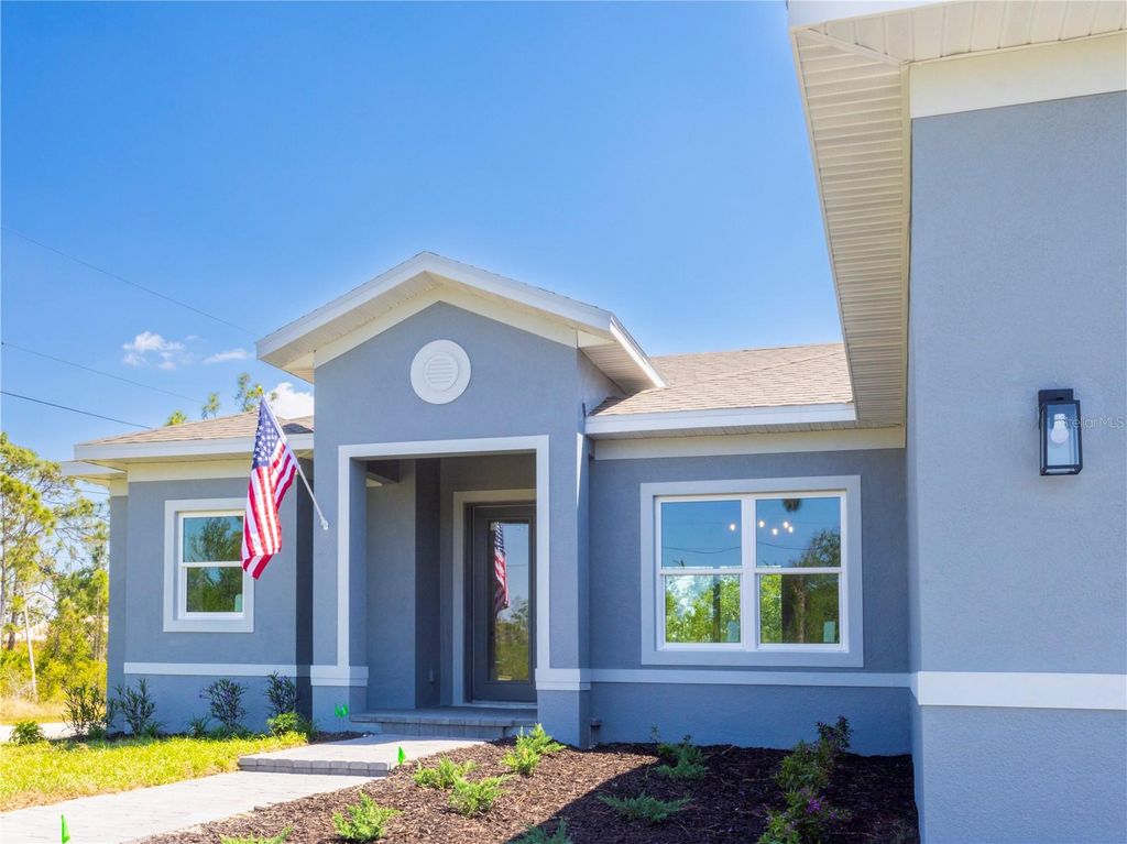 Photo of 9249 King Hill Street, Port Charlotte, FL 33981 (MLS # O6352234)