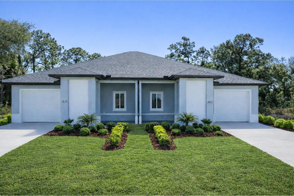 Photo of 2421 Milton Avenue S, Lehigh Acres, FL 33973 (MLS # C7522475)